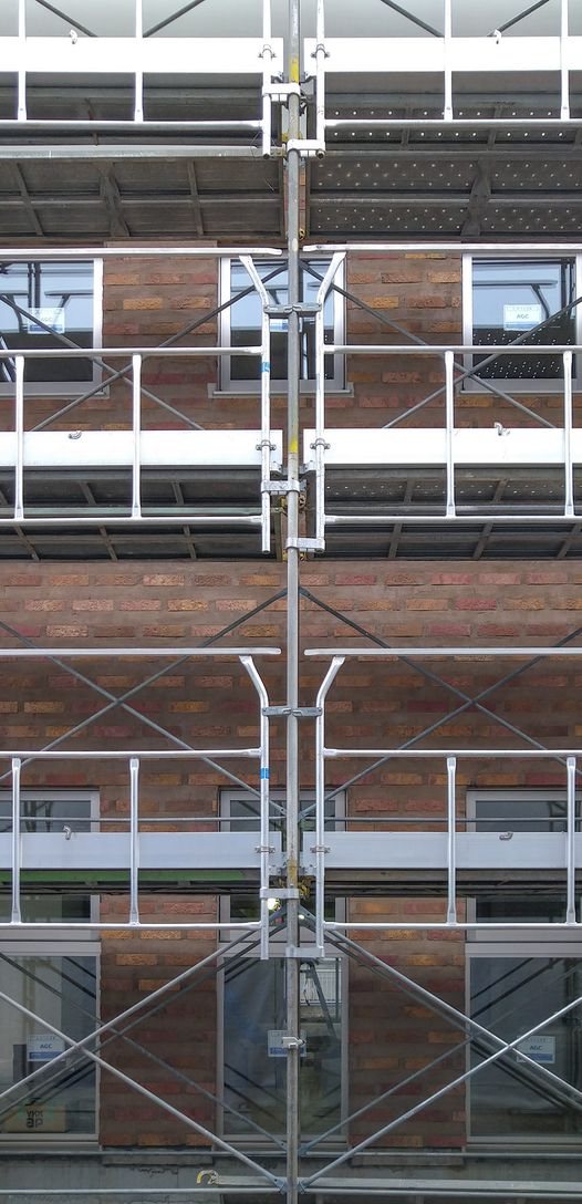 The north exterior wall of the Nursery School is lined with brick through a 7-meter plaza.